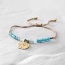 Mar Bella. Turquoise bracelet with a coin