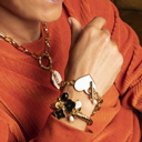 Face of an angel. Chain bracelet with a white heart