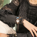 Casual chic. Leather bracelet with charms