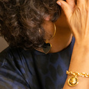 Harley, darling. Golden earrings with black hearts