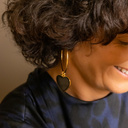 Harley, darling. Golden earrings with black hearts