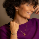 Botswana. Hoop earrings with green crystals