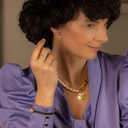 Loose. Necklace with pearls and chains