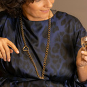 Love is a fire. Chain necklace with a heart