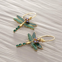 Among flowers. Green dragonfly earrings