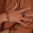 Scorpio's soul. Sculpted ring with garnet, pearls, and crystals