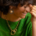 Love is madness. Chain necklace with a heart