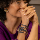 TAKE A BOW. Fan-shaped earrings with blue crystals