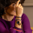 Casual chic. Leather bracelet with charms