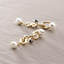 Mademoiselle. Drop earrings with pearls