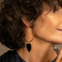 Harley, darling. Golden earrings with black hearts