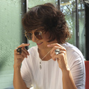 MORTICIA. Double ring with flowers