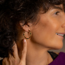 Botswana. Hoop earrings with green crystals