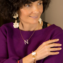 Face of an angel. Chain bracelet with a white heart