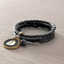PAINT IT BLACK. Bracelet with charms