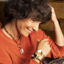 Face of an angel. Chain bracelet with a white heart