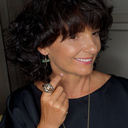 Among flowers. Green dragonfly earrings