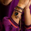 Casual chic. Leather bracelet with charms