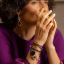 Casual chic. Leather bracelet with charms