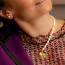 Loose. Necklace with pearls and chains