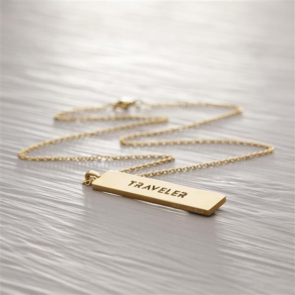 TRAVELER. Dog tag with a word